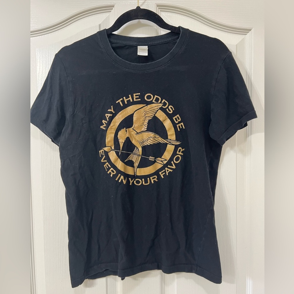 Hunger Games “May the Odds be Ever in your Favor” shirt. Women’s size small